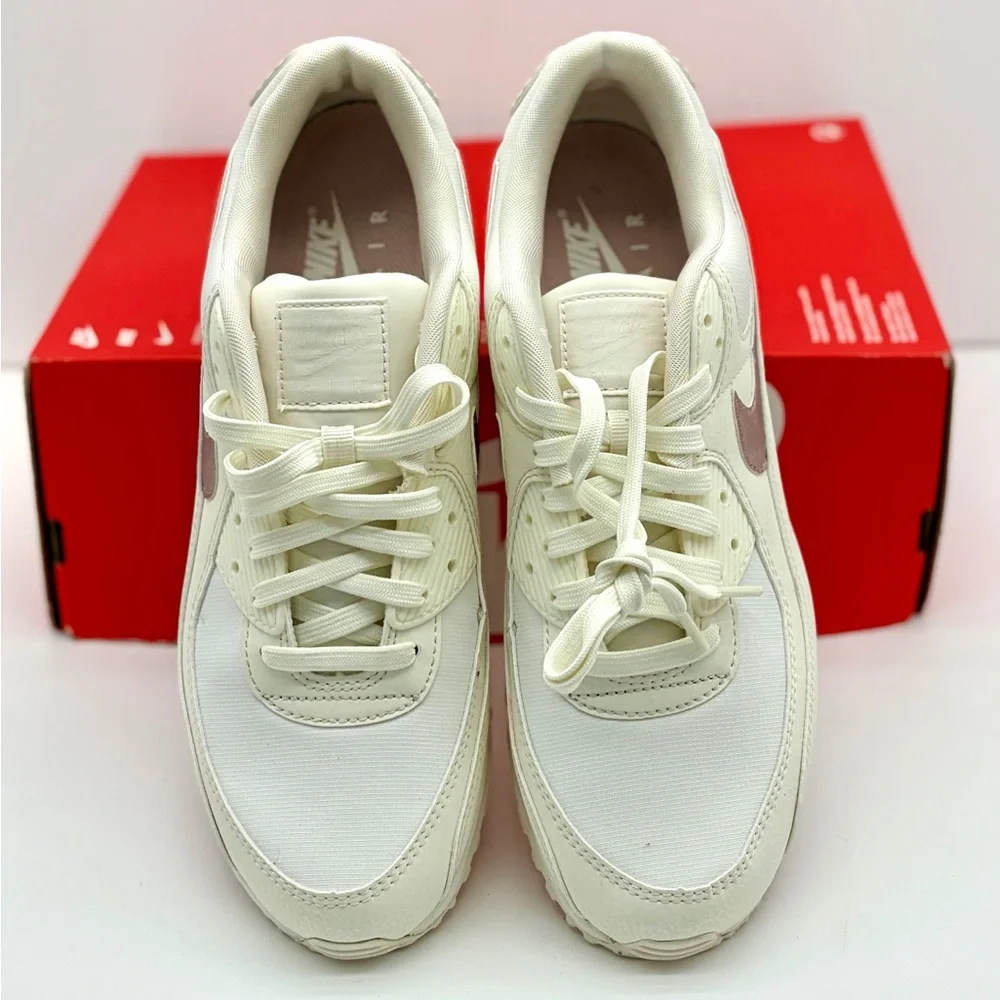 Nike Women's Sneaker in Cream with Pale Pink Swoosh